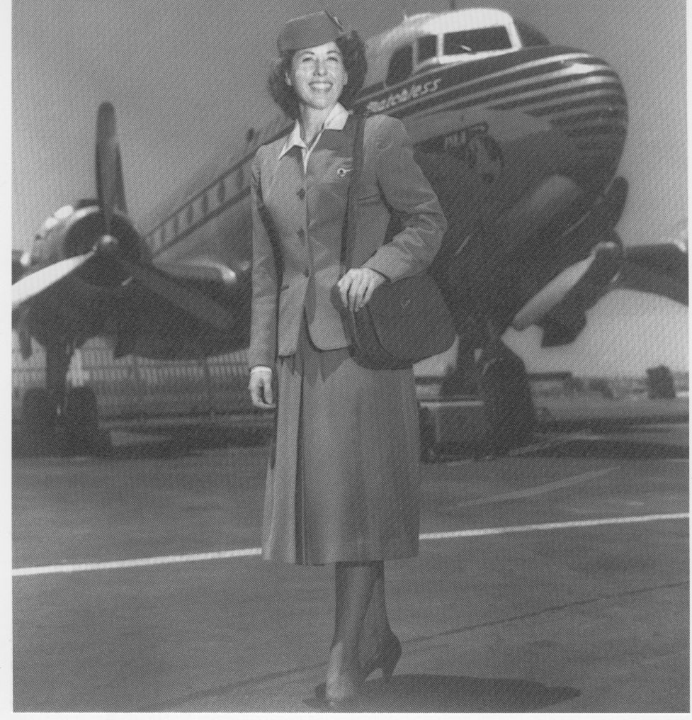 1940s  Flight Attendant  Fran Walker Brown posing by a DC4.